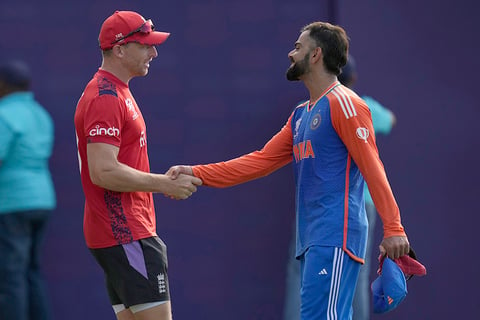 Virat Kohli shake hands with England's captain Jos Buttler 